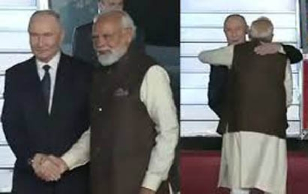 প্ৰধানমন্ত্ৰী নৰেন্দ্ৰ মোদীৰ বিমানবন্দৰত পুটিনক উষ্ম আদৰণি