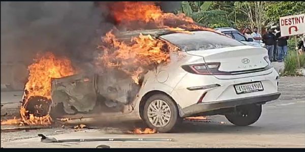 নগাঁৱৰ ৰাজপথত দাউ দাউকৈ জ্বলিল এখন বিলাসী বাহন