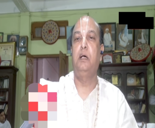 Image of the Satradhikar of Auniati Satra, Shri Shri Pitambar Dev Goswami.